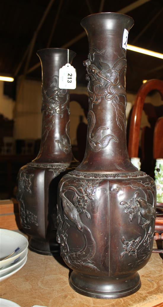 A pair of large Japanese bronze bottle vases, late 19th century, 47cm, Chinese rosewood stands